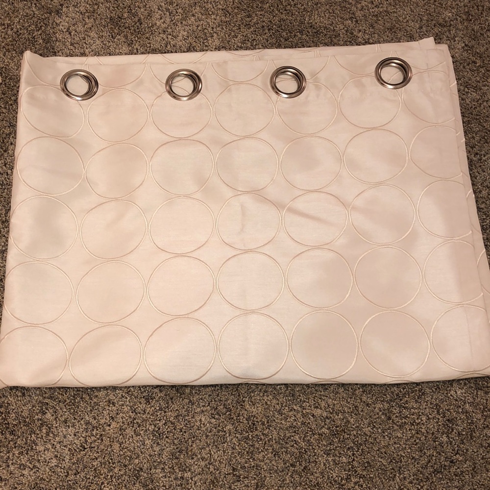 Ivory full length hoop curtains.